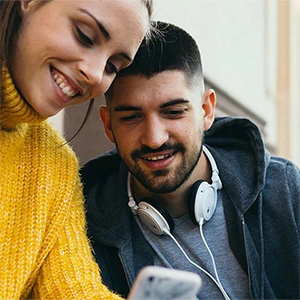 Psychology students looking at cellphone